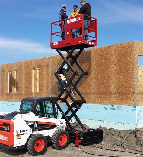 man lift skid steer|skid steer scissor lift.